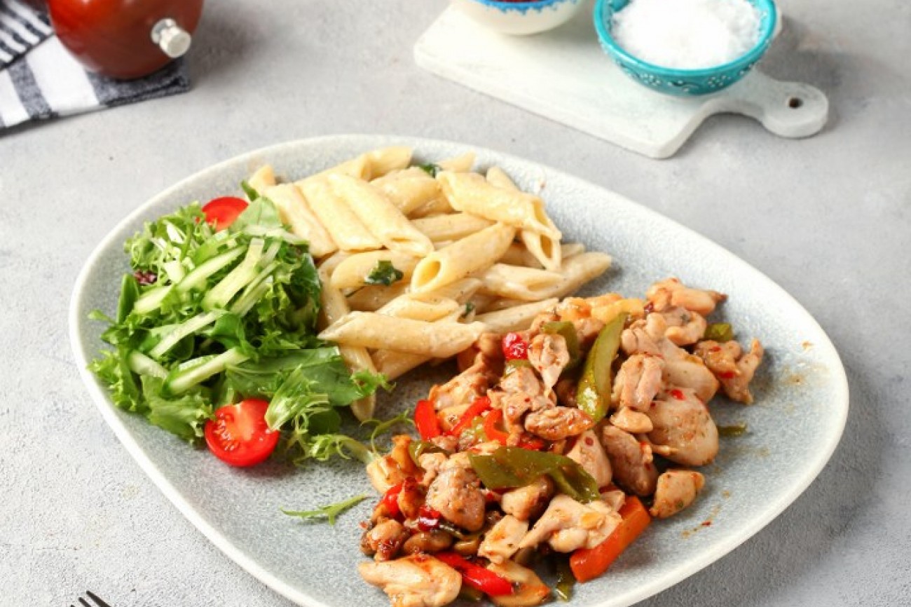 Soy sauce chicken with potatoes, rice and salad