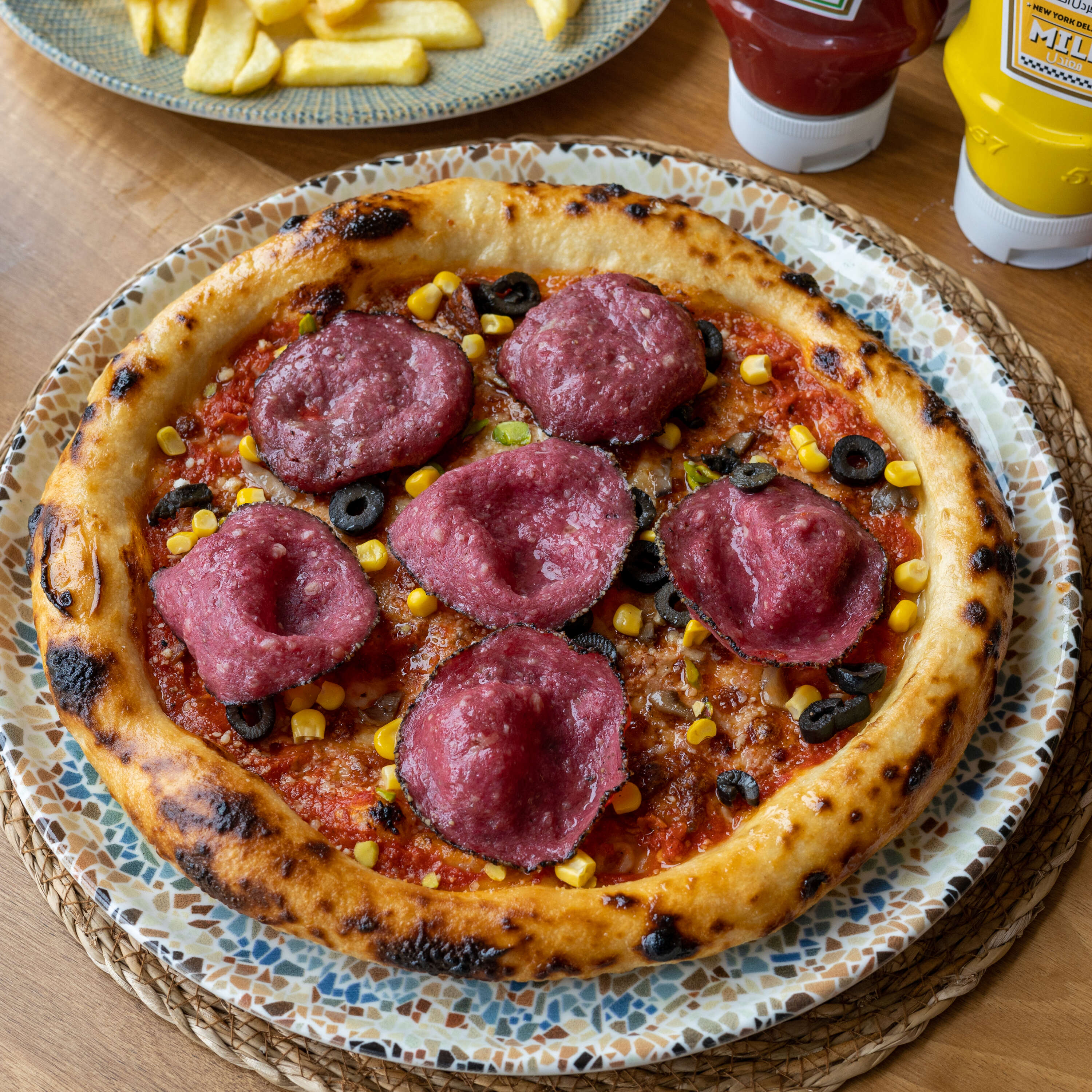 Napoli pizza with black pepper and Italian salami