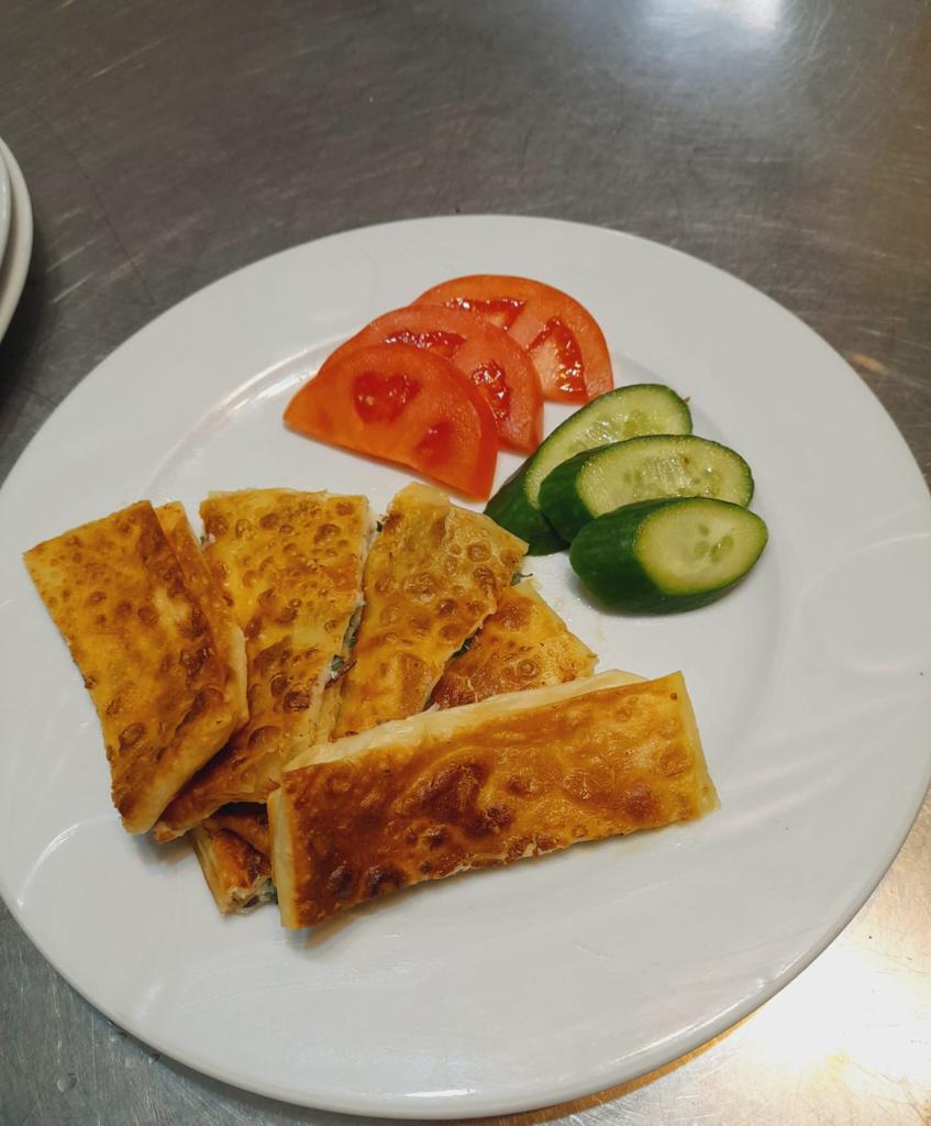 Gözleme with Ezine white cheese and parsley, tomato and cucumber