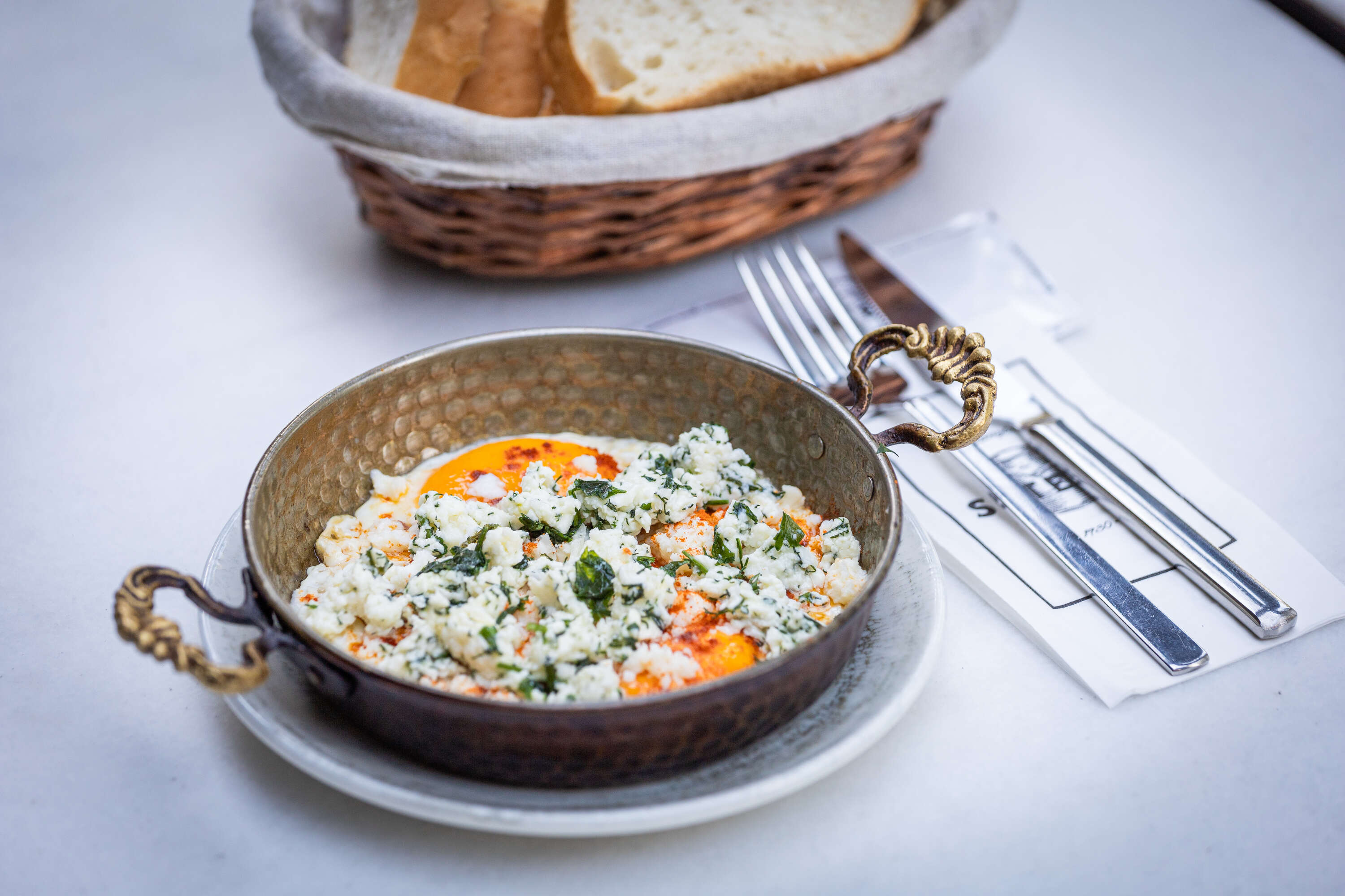 Herbed eggs with white cheese