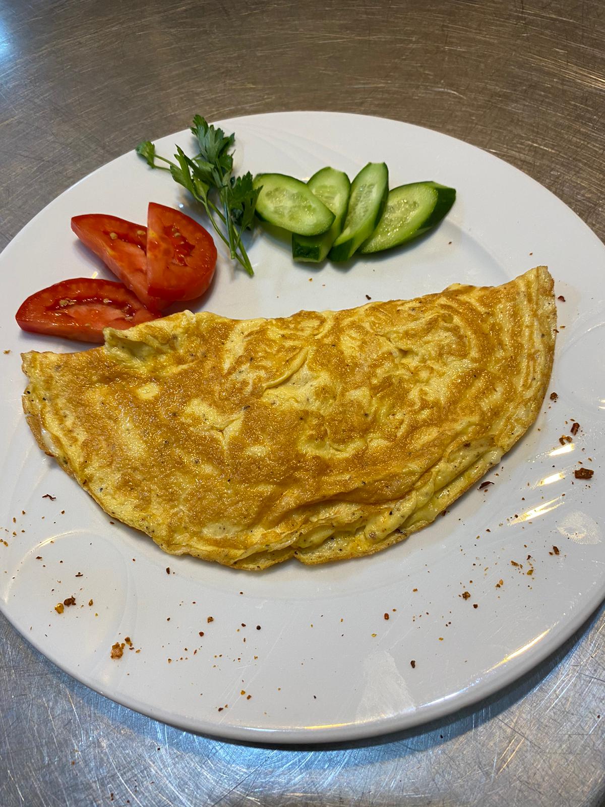 Omelet with tomato and cucumber