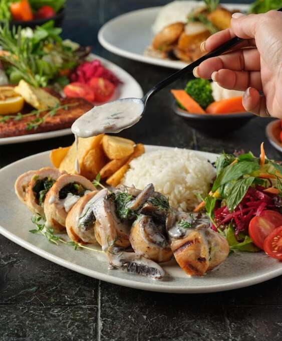 Spinach-stuffed chicken roulade
