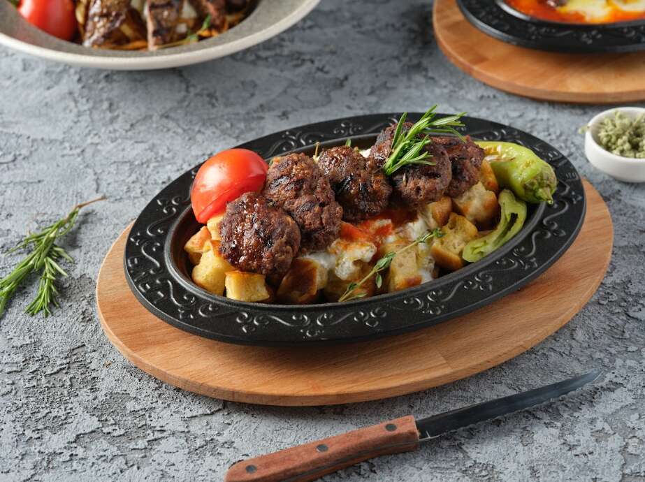 Meatballs with bazlama and tomato sauce