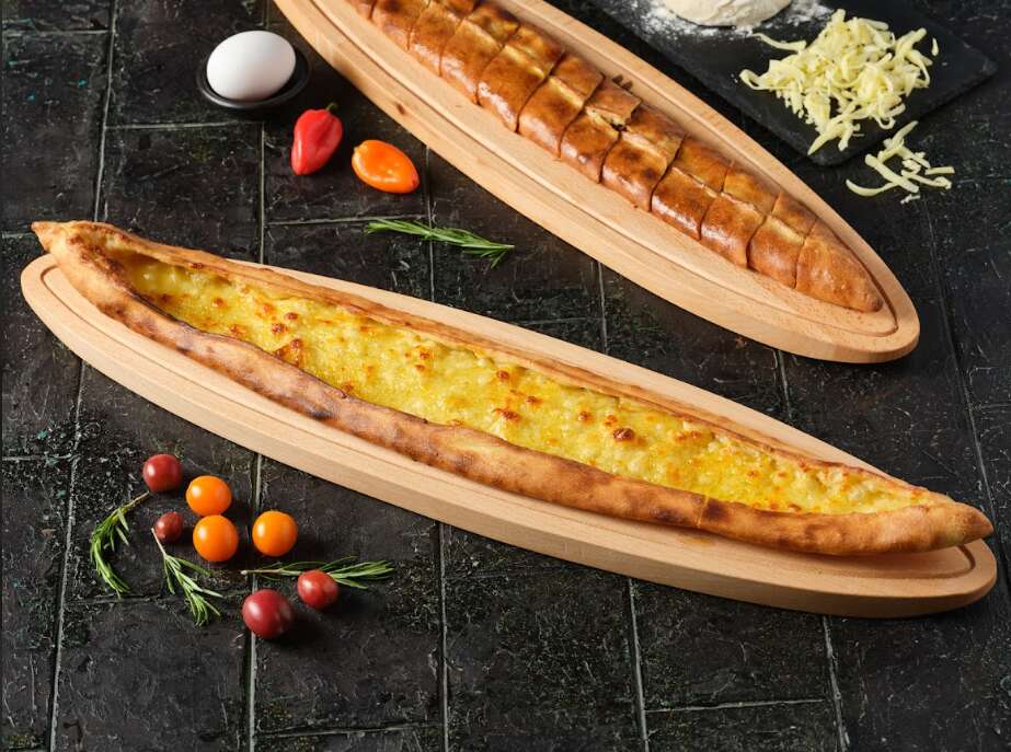 Open pide with white cheese