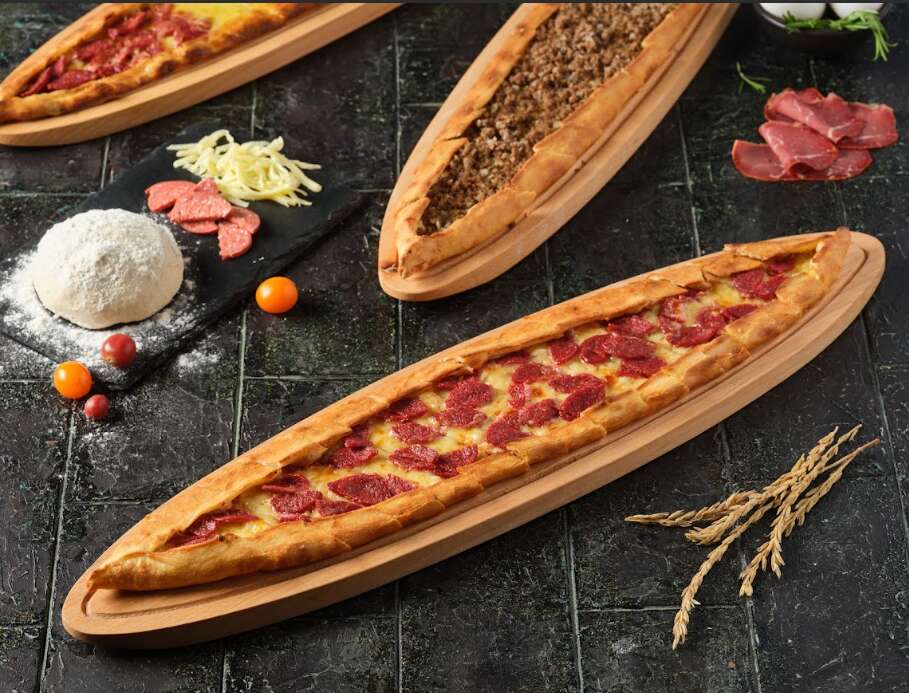 Open pide with sucuk