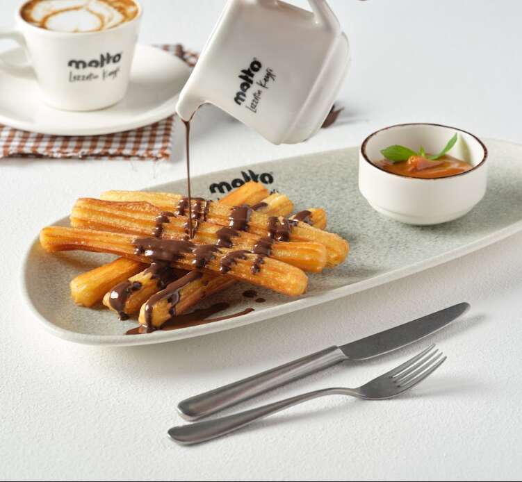 Churros with caramelized milk jam and chocolate sauce