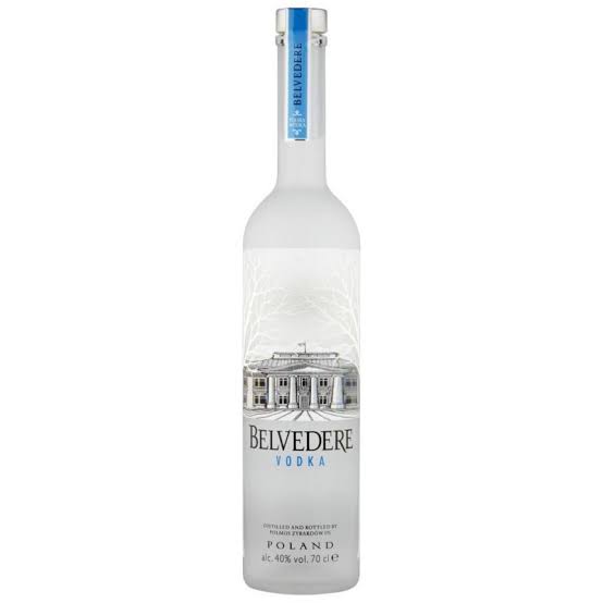 Belvedere 70 cl vodka with premium snacks, cashews, chocolate, fruit, Red Bull, soda, and cola