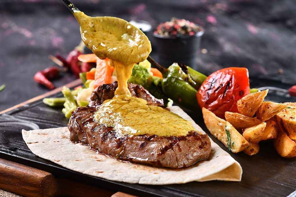 Café de Paris Sauce Tenderloin with French Fries and Coleslaw