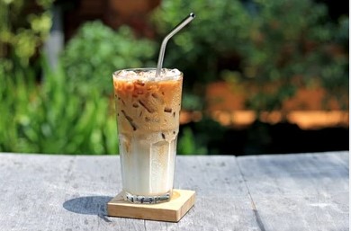 •	ICED CARAMEL MACCHIATO