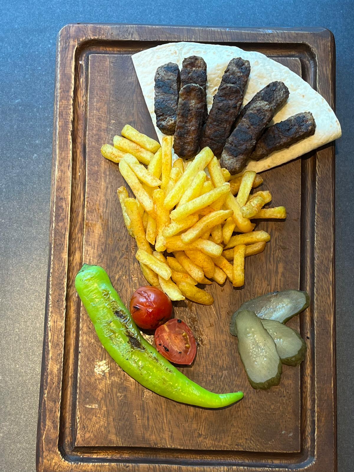 şş